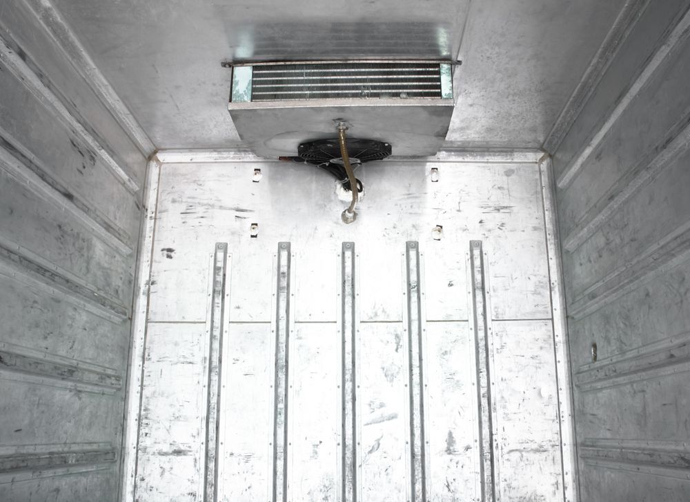 Interior of a Refrigerated Truck With Cooling Unit Mounted on the Ceiling — Hines Logistic Pty Ltd In Newcastle, NSW