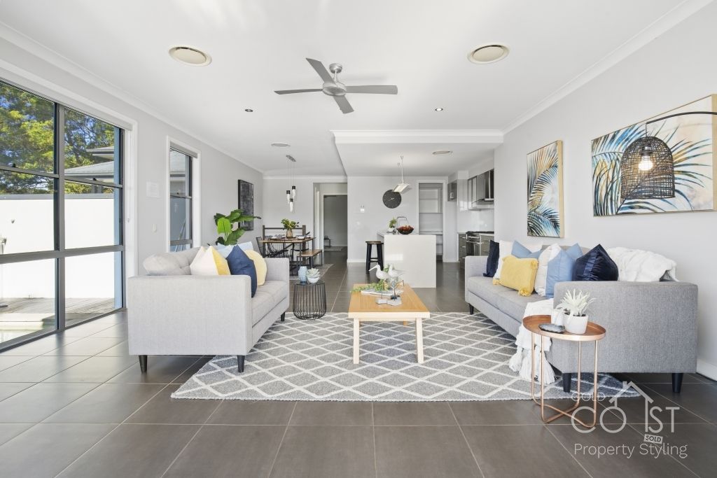 A living room with two couches and a coffee table