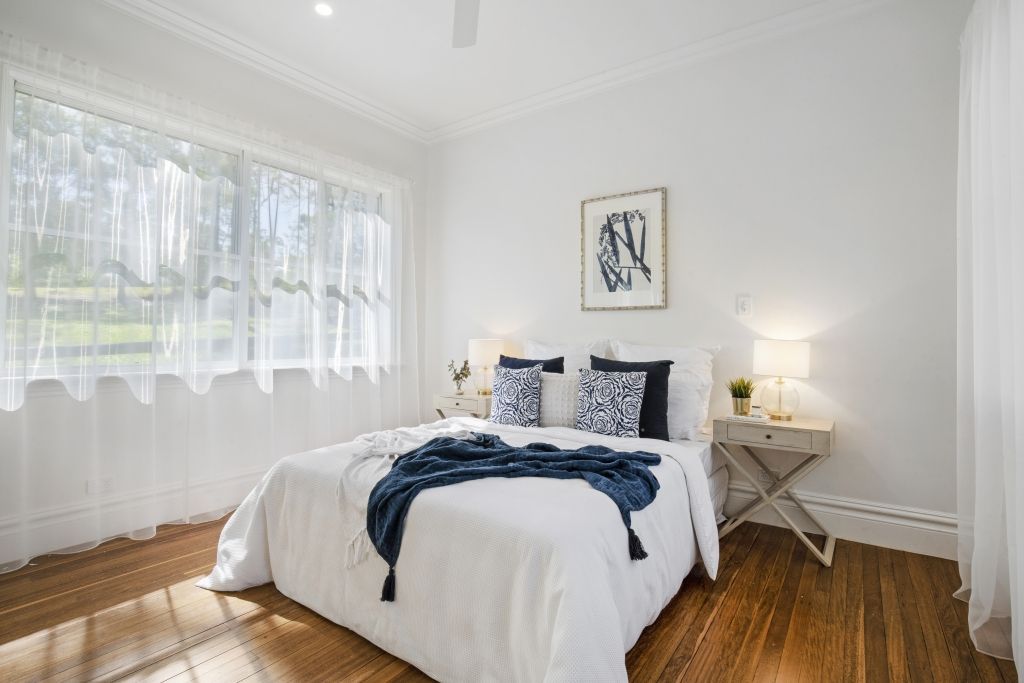 There is a large bed in the middle of the room.
