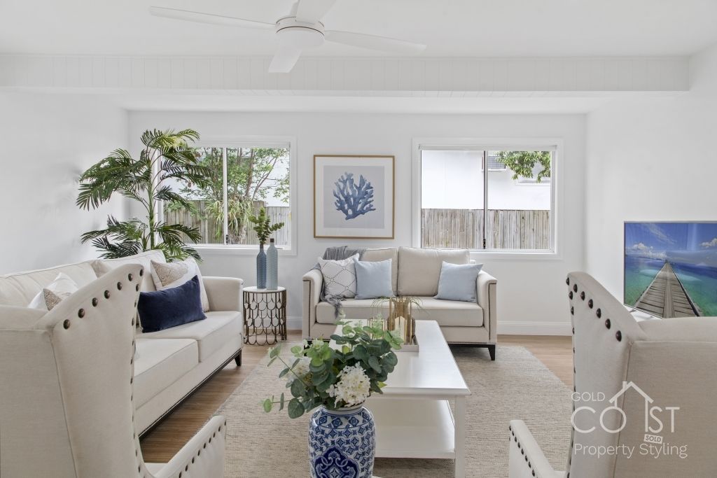 A living room filled with furniture and a coffee table.