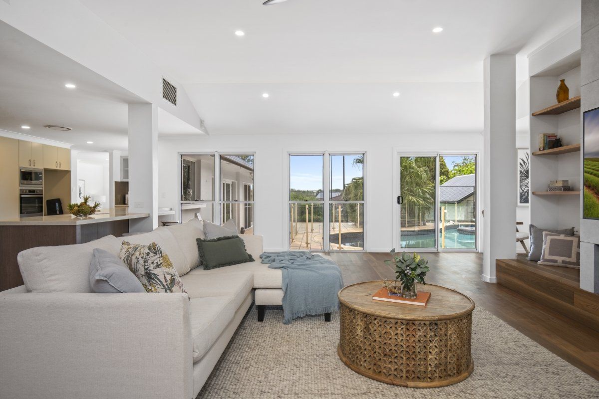 A living room with a couch and a coffee table