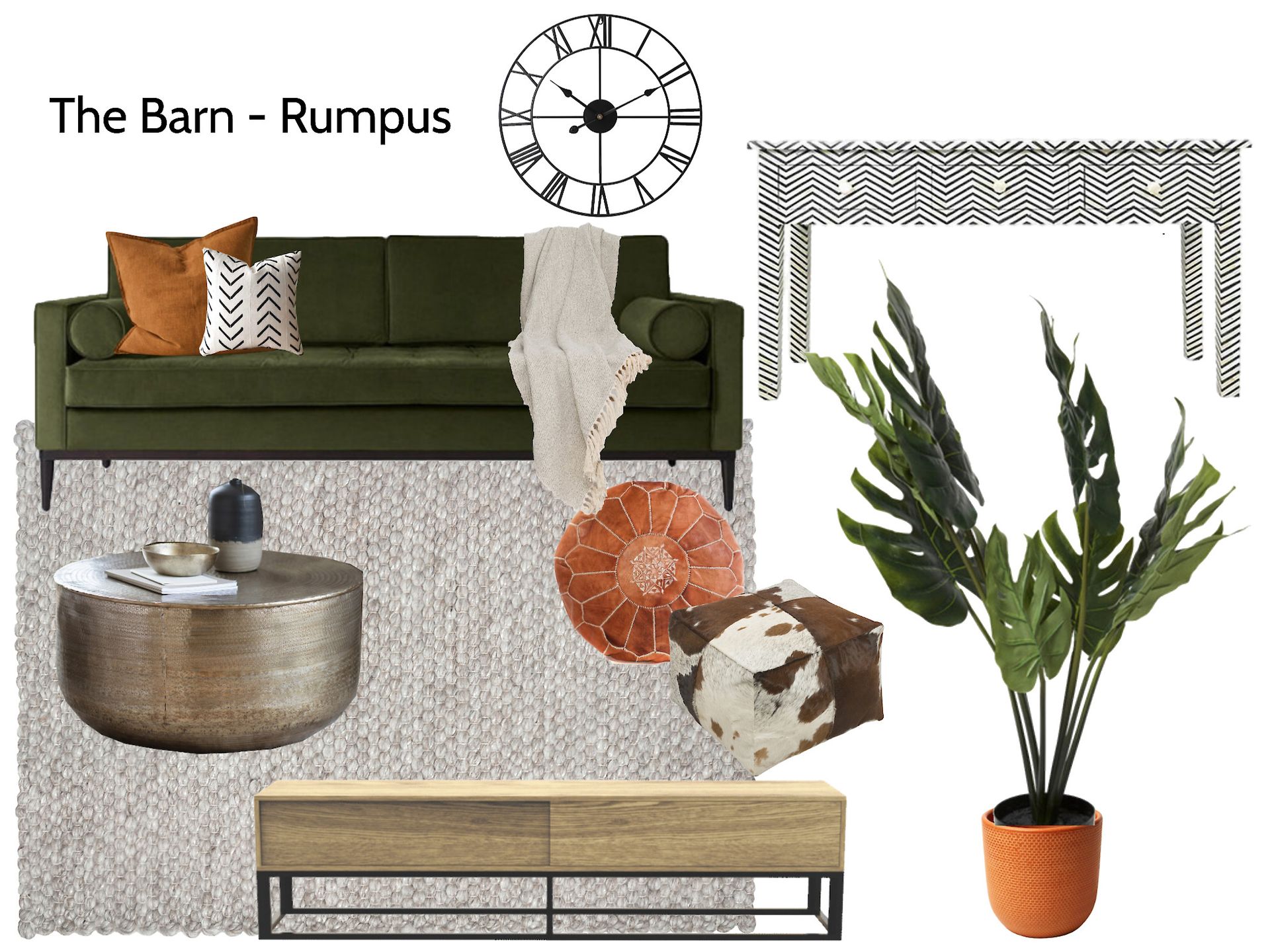 A living room with a green couch , a coffee table , and a plant.