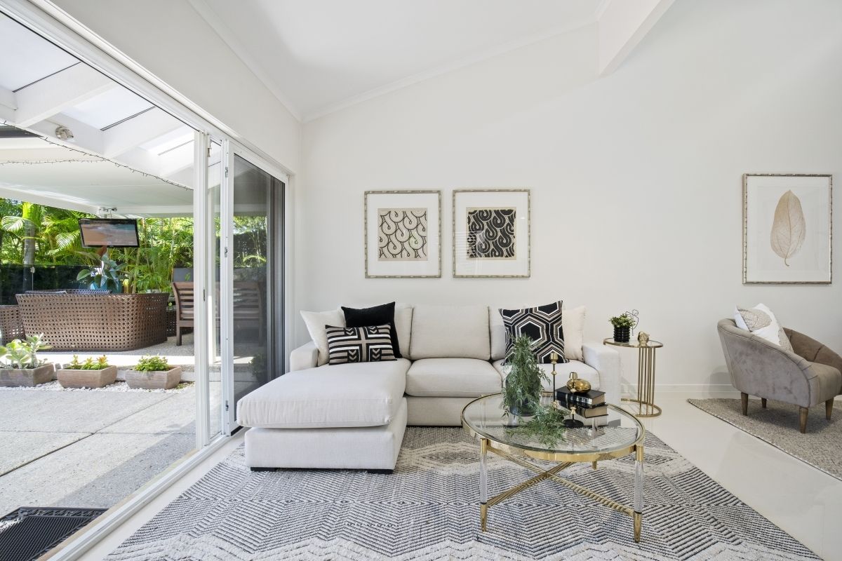 A living room with a couch and a coffee table