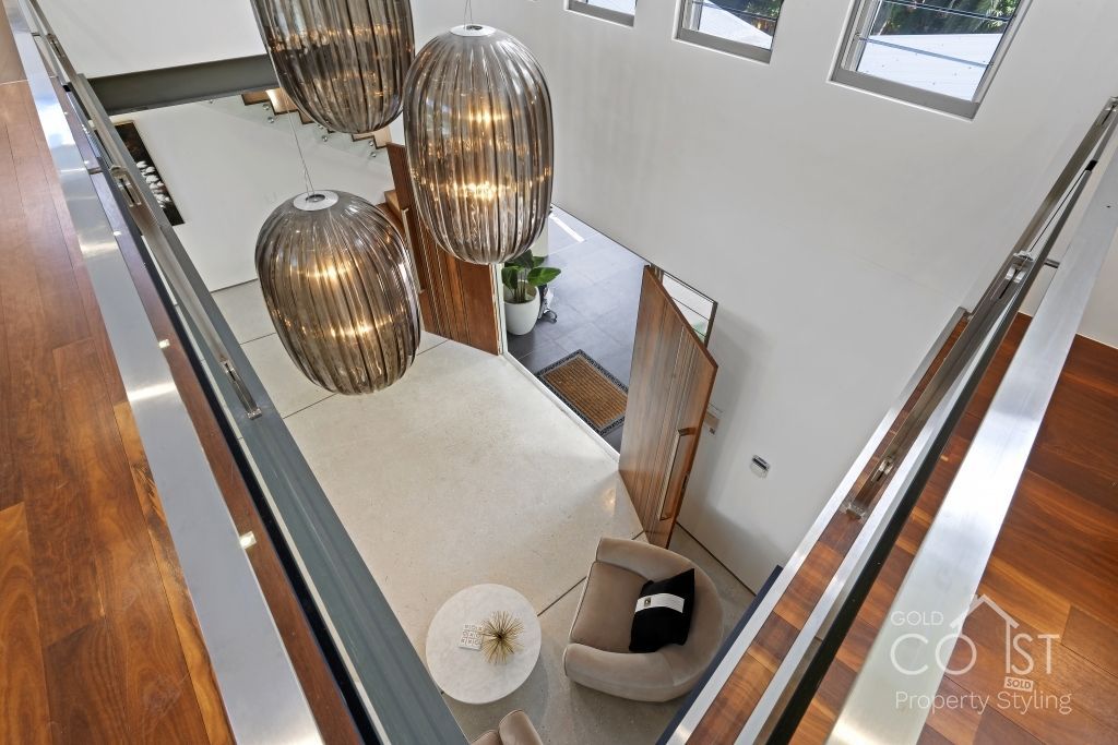 An aerial view of a living room from the second floor