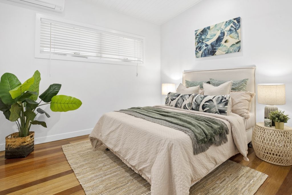 There is a large bed in the middle of the room.