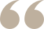 A pair of quote marks on a white background.