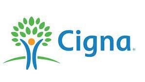 The cigna logo has a tree and a person in it.