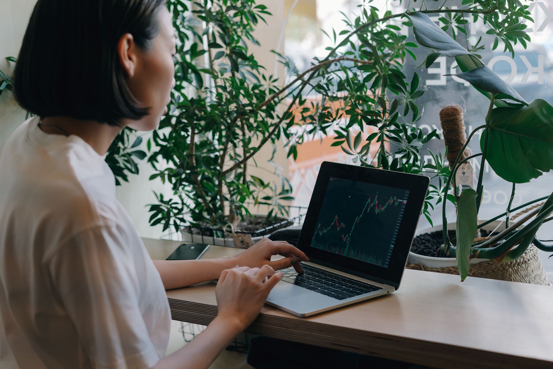 Business owner using cloud accounting software on her laptop