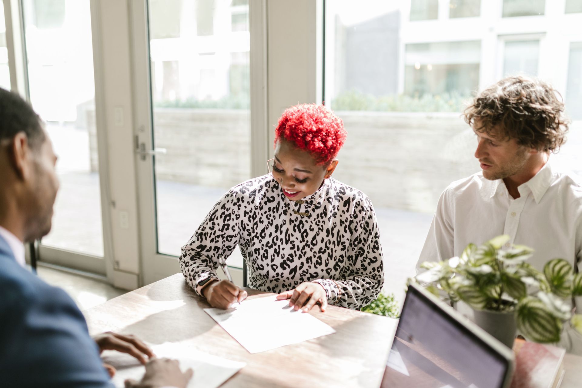 Business owners meeting a banker to open a business account