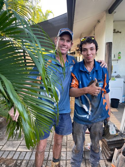 Smiling man in blue and red sports shirt — Tap & Drain Doctor NT in Winnellie, NT