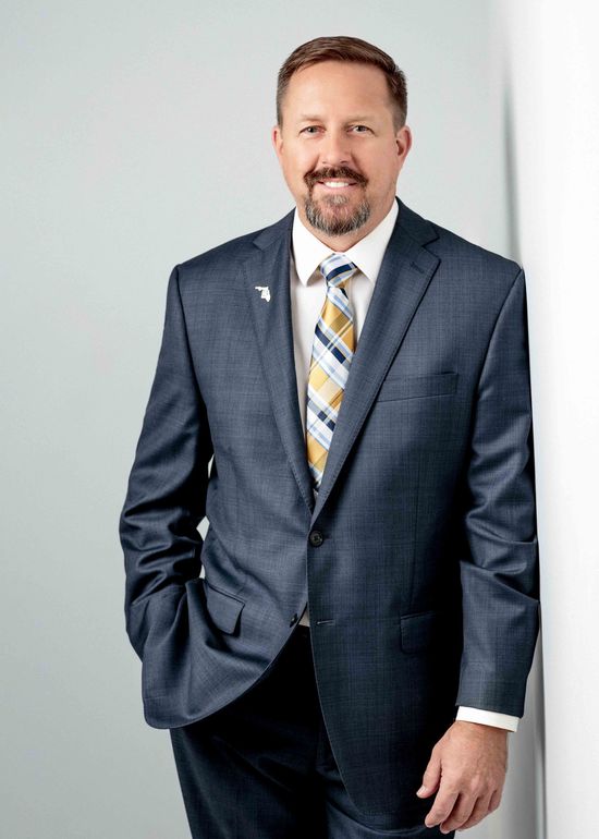 David Puskaric leaning against a wall