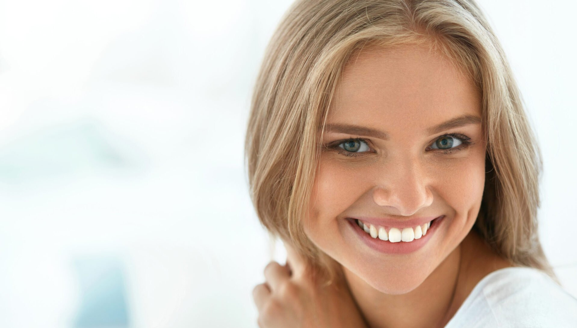 young caucasian blonde woman with beautiful skin