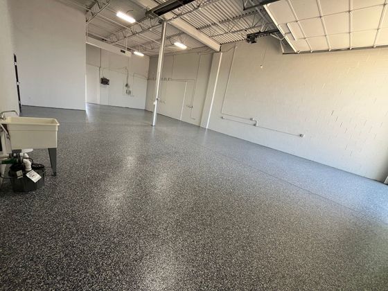 There is a sink in the middle of the room.