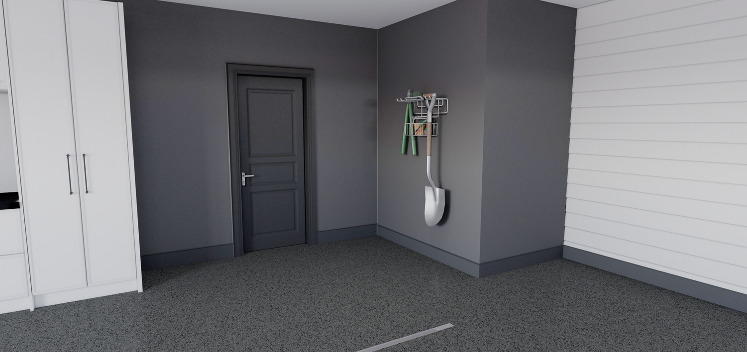 A room with a door and a shovel hanging on the wall.