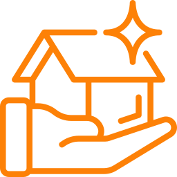 A hand is holding a house with a star on the roof.