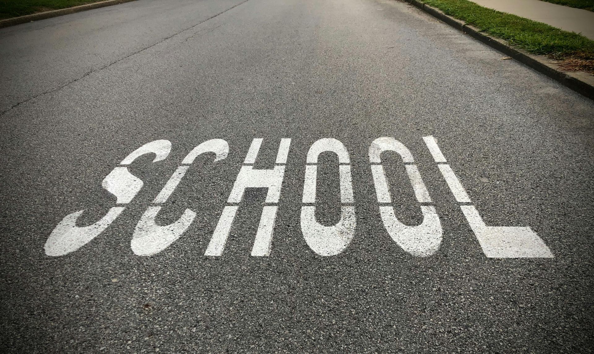 School lettering on road