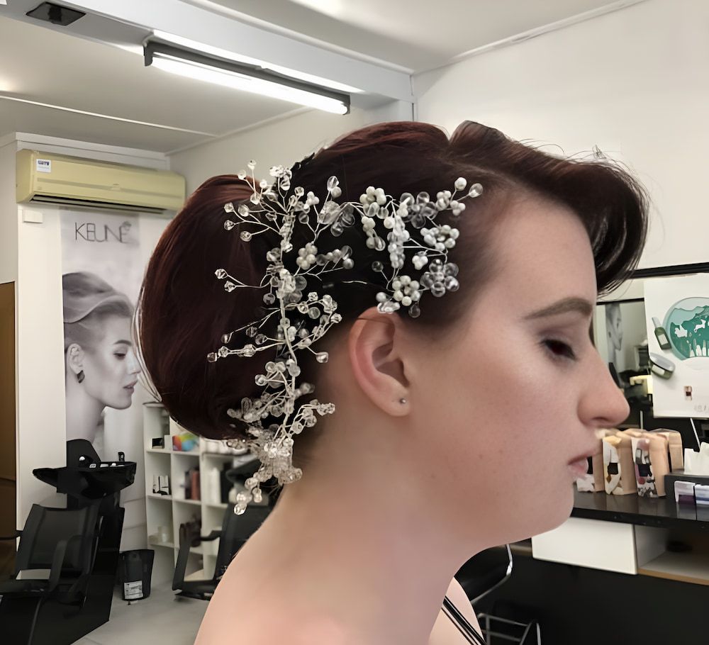 A Woman With Flowers In Her Hair In A Salon — Howard Street Hair Studio In Nambour, QLD