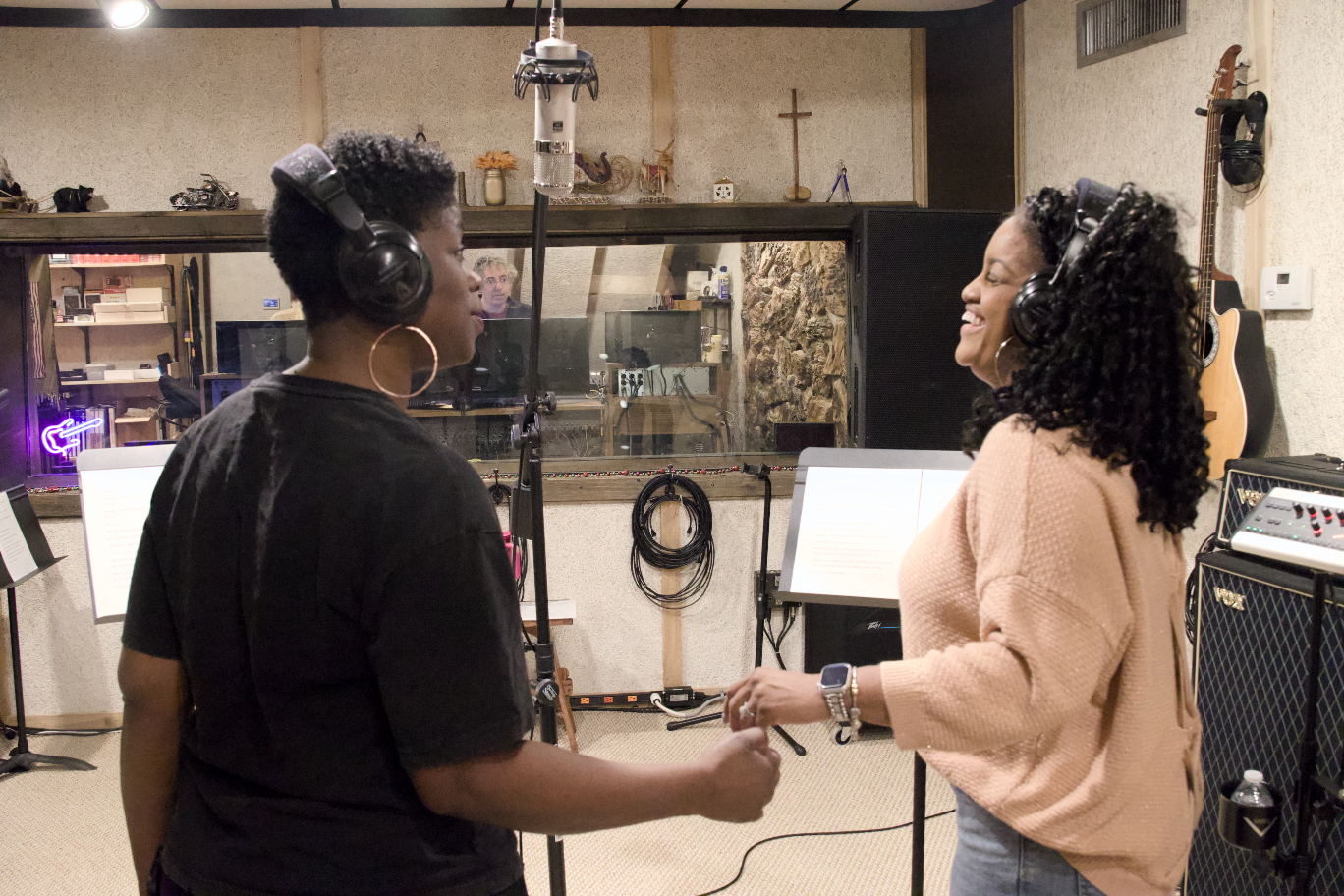 Desirea and Raven in the studio recording voices