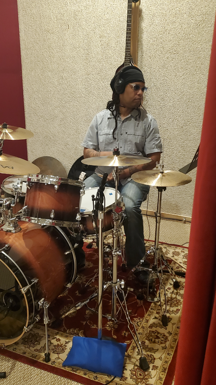 Sweet Child drummer at kit in the studio