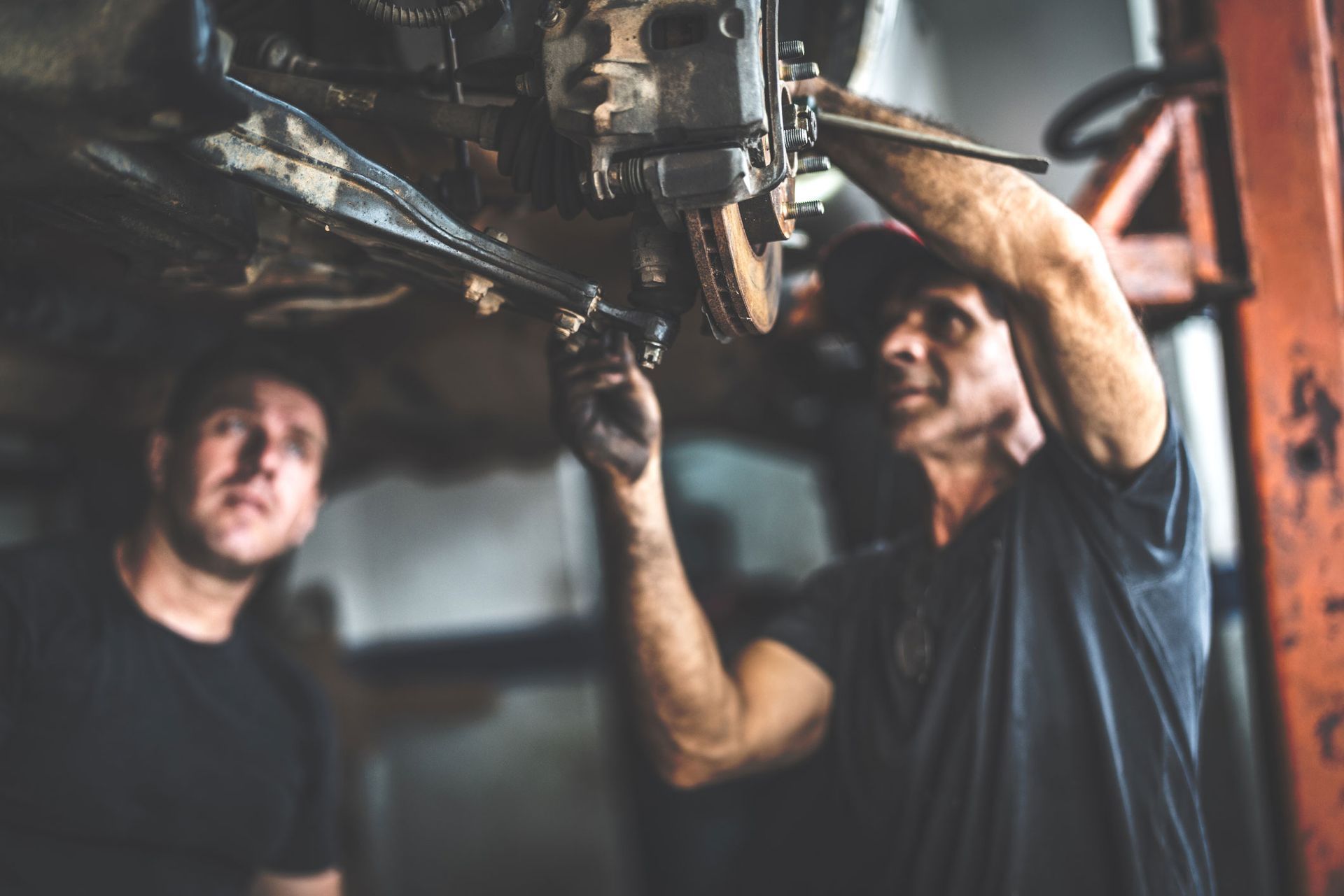 Two Men Fixing A Car | Brainard, NE | CTF Service Inc Two Men Fixing A Car | Brainard, NE | CTF Service Inc