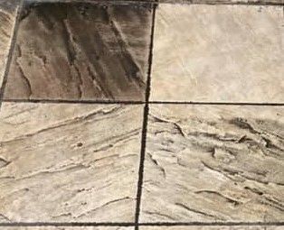 A close up of a tile floor before and after being cleaned.