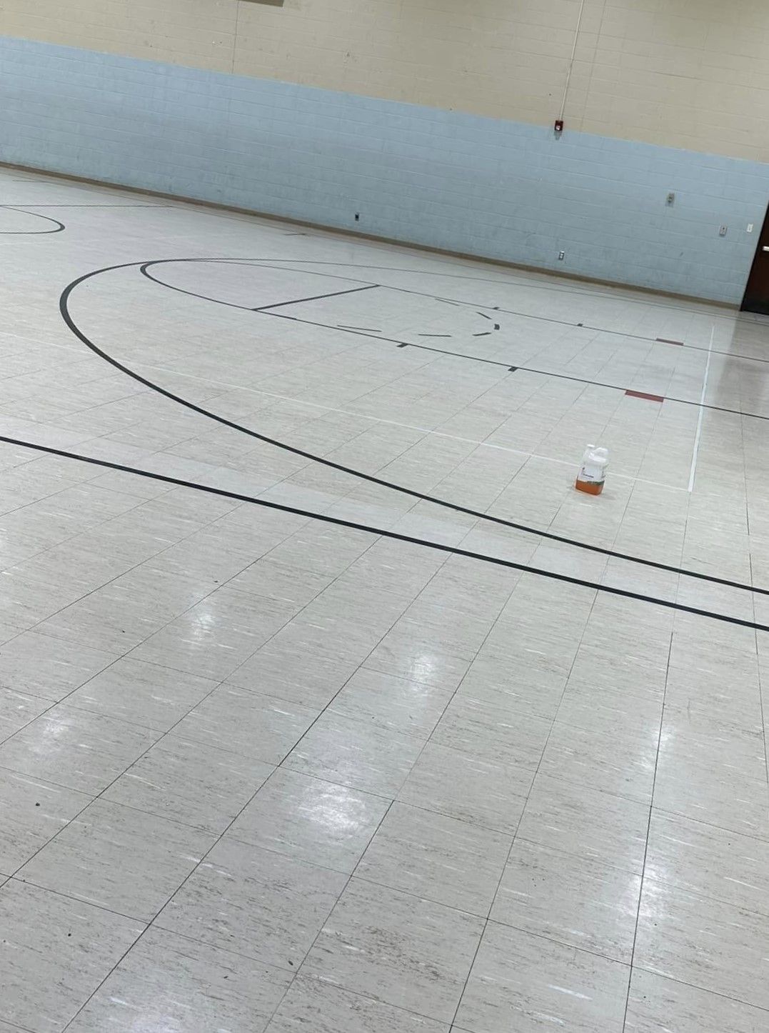 A basketball court with a few lines on it
