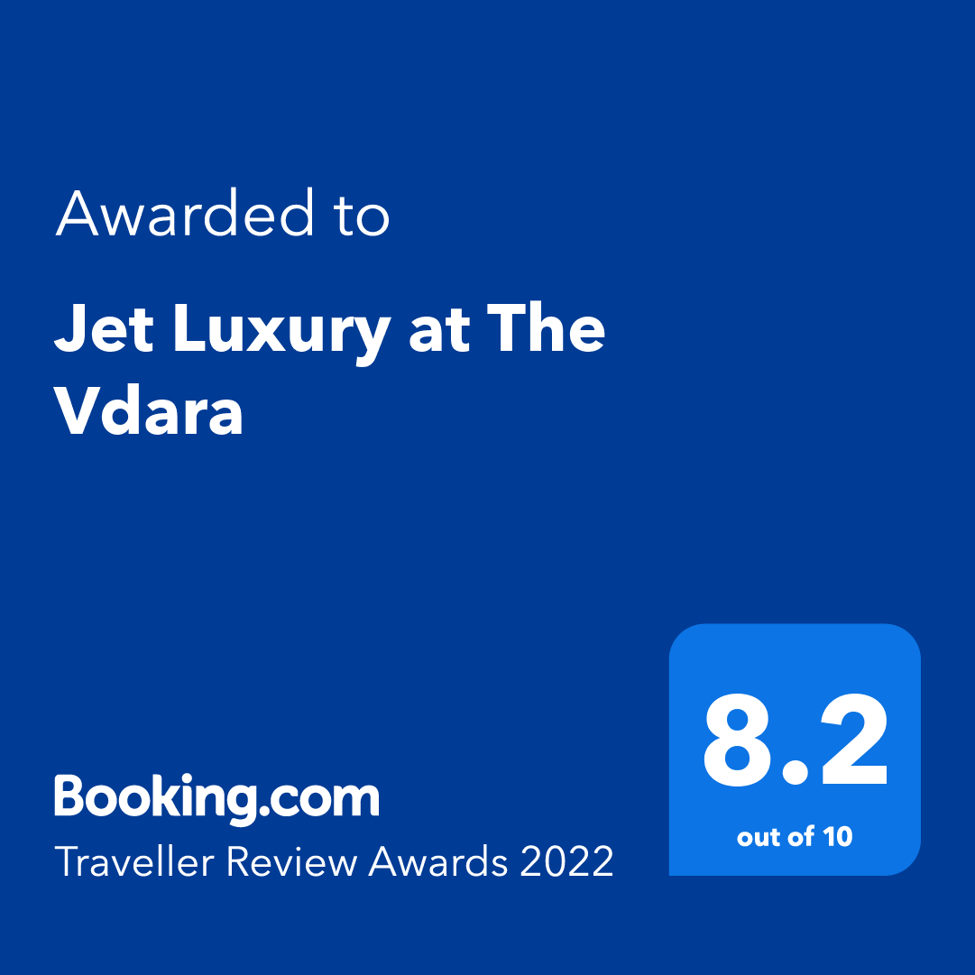 Booking.com Traveller Review Awards 2022 badge for Jet Luxury at The Vdara, blue with 8.2 score