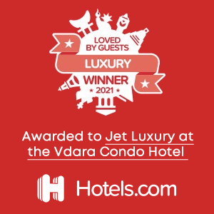 Red Hotels.com award badge reading “Loved by Guests Luxury Winner 2021” for Jet Luxury at the Vdara Condo Hotel
