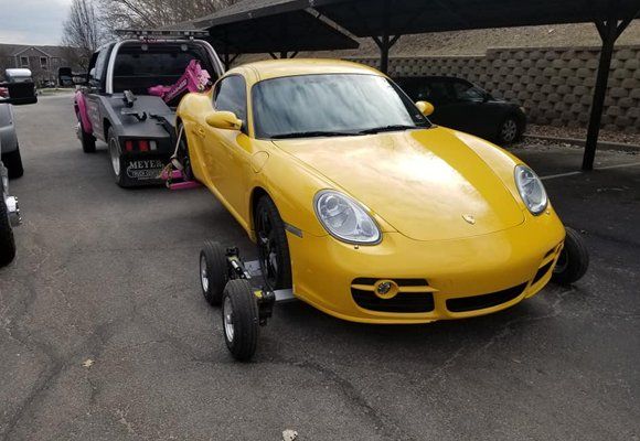 Towing yellow car Towing yellow car