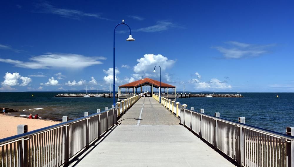 Pier Leading to the Ocean on a Sunny Day — Payless Timbers in Cape York, QLD