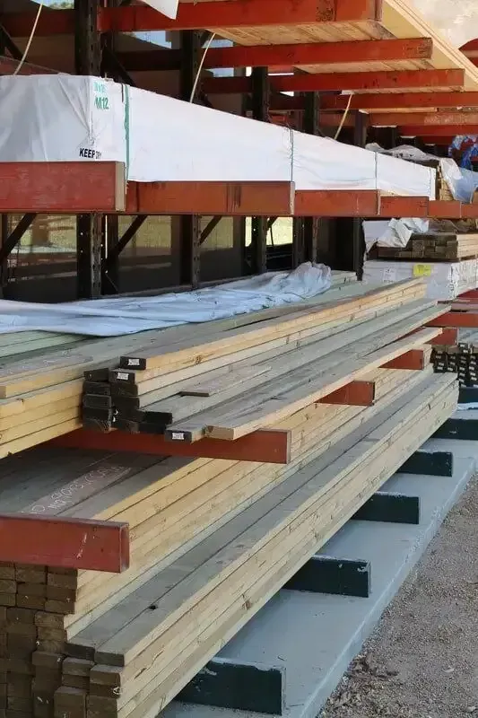 Bunch of Wooden Boards Are Stacked on Top of Each Other — Payless Timbers in Tablelands, QLD