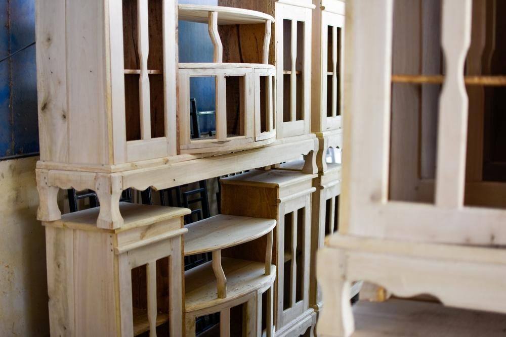 Bunch of Wooden Cabinets Are Stacked — Payless Timbers in Cairns, QLD