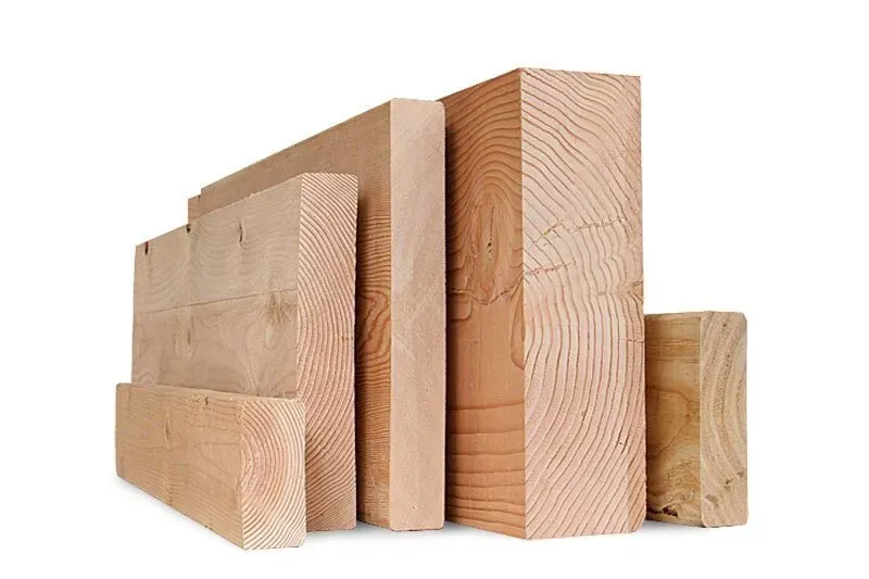 A group of wooden blocks stacked on top of each other on a white background — Payless Timbers in Tolga, QLD