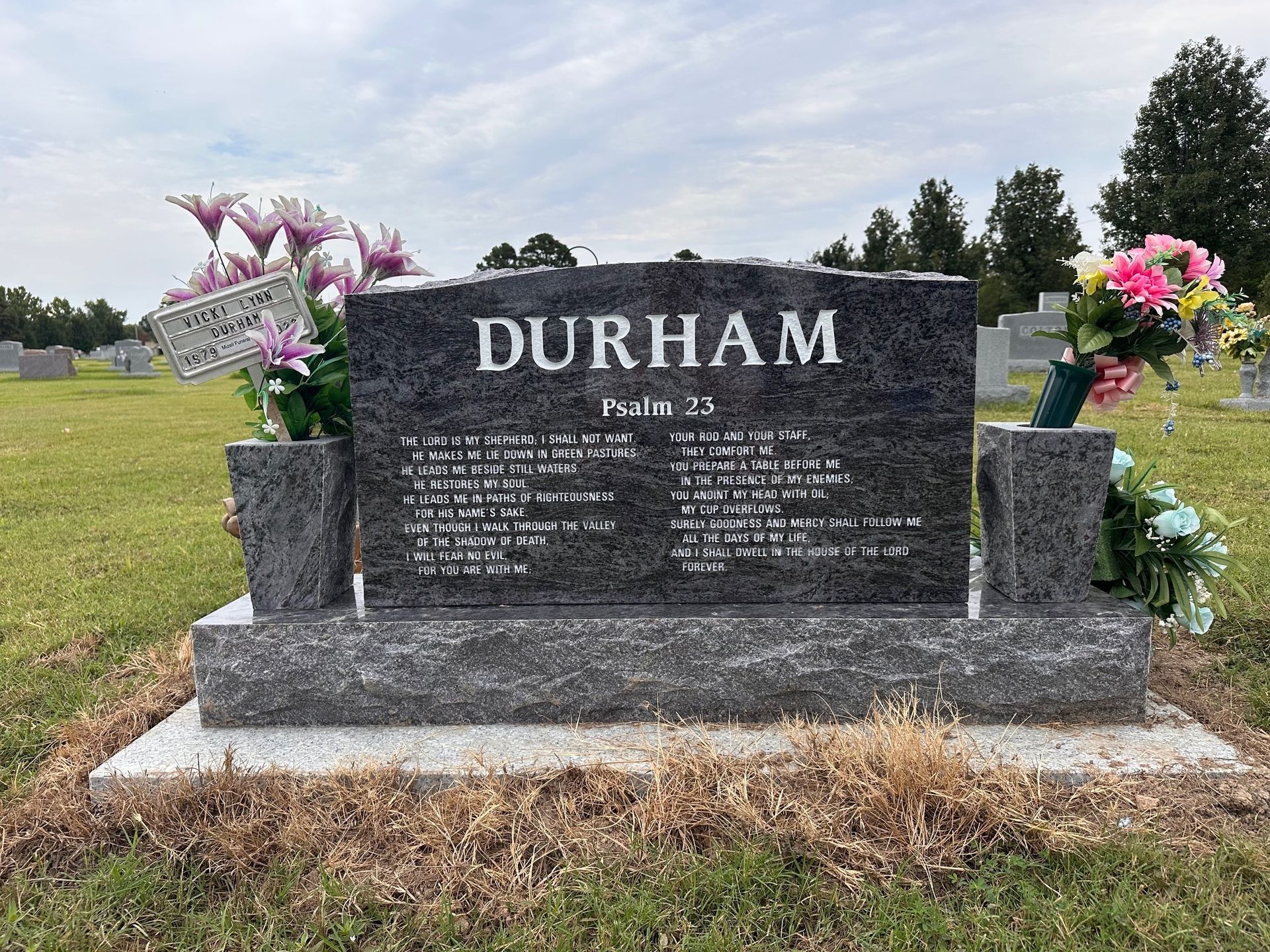 Tombstone in a cemetery, engraved