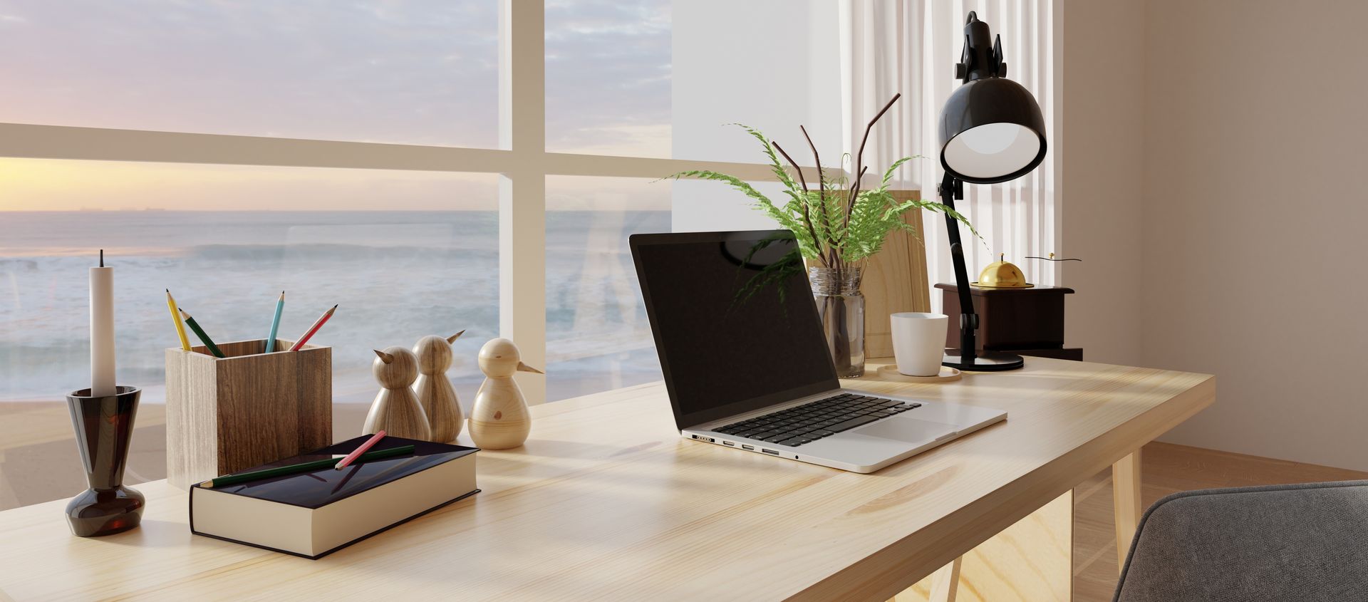 A modern home office with a large window and a view of the ocean 