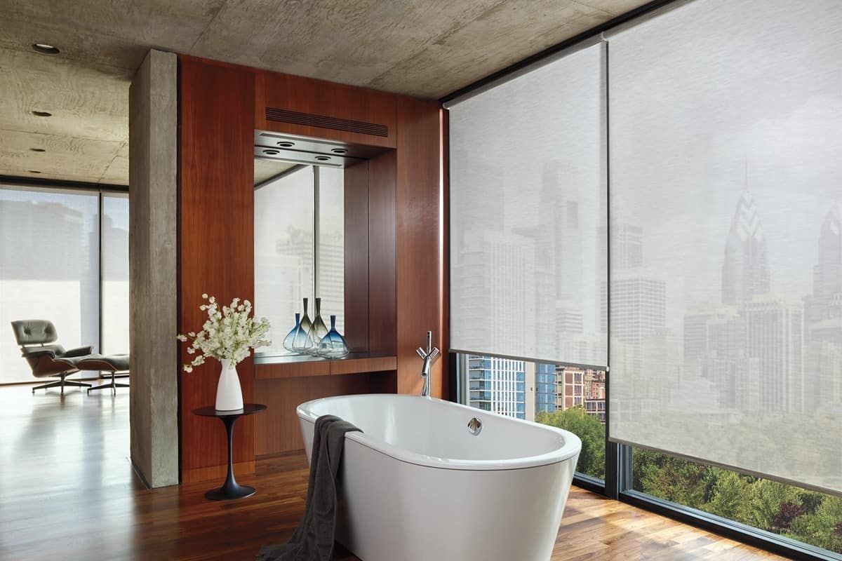 Automated shades protecting NYC bathroom