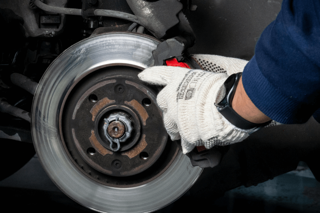 mechanic doing a brake repair