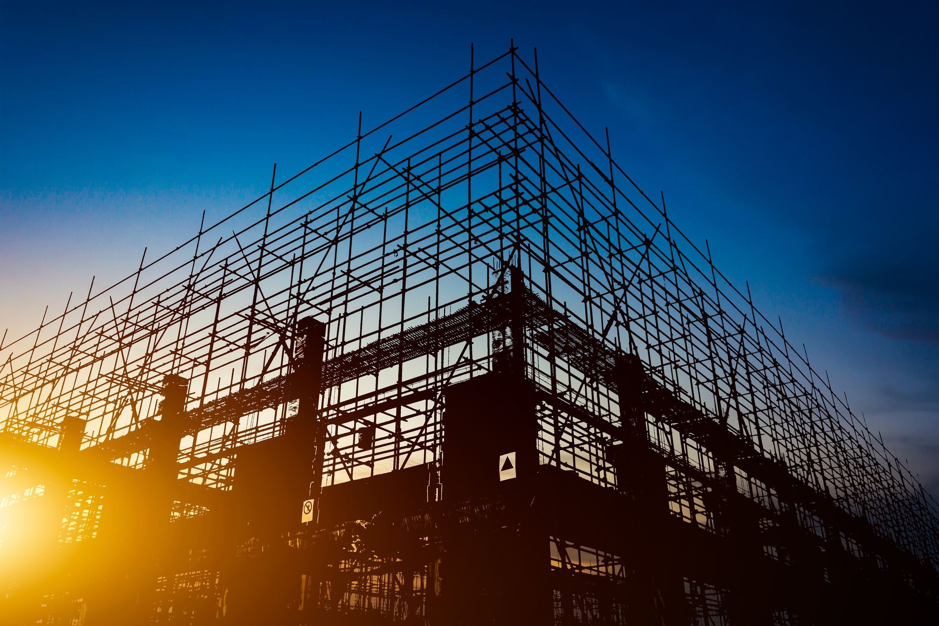 A building is being built with scaffolding around it.