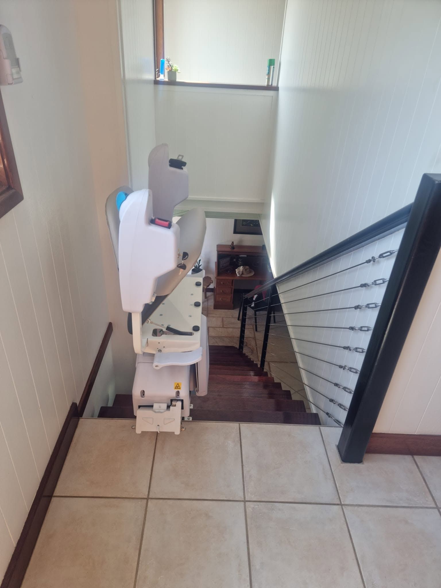 Chair Lift In Cairns Installed On Timber Stairs For Safe, Easy Home Access Between Two Floors