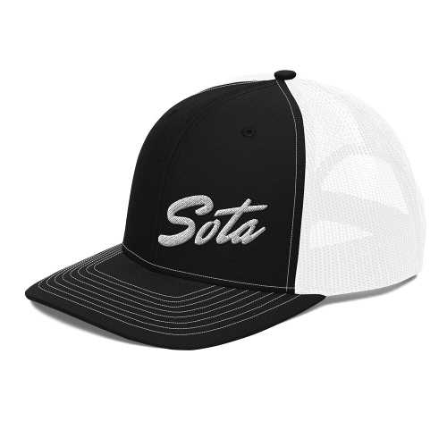 A black and white trucker hat with the word sota embroidered on it.