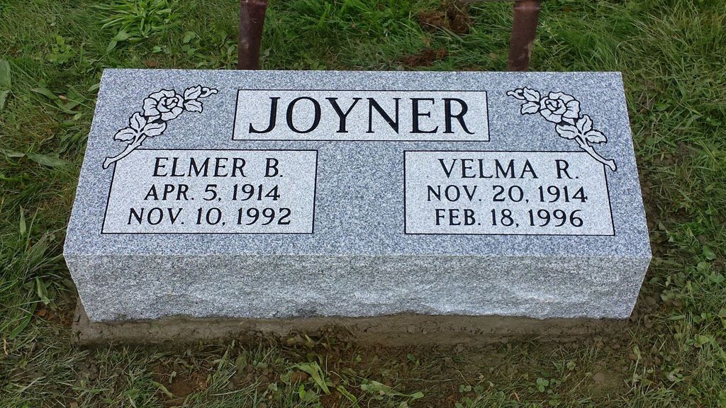 Gravestone with JOYNER engraved, marking Elmer R. and Velma R. in a cemetery.