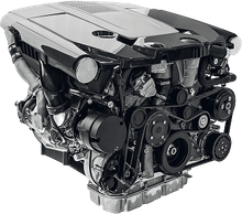 Black automotive engine isolated on a white background | Lowry Repair Center Inc