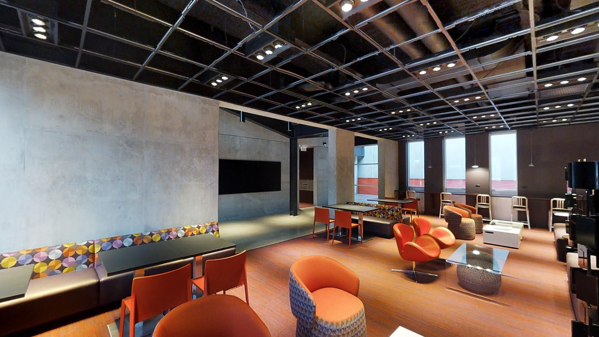 A large room with a lot of chairs and tables