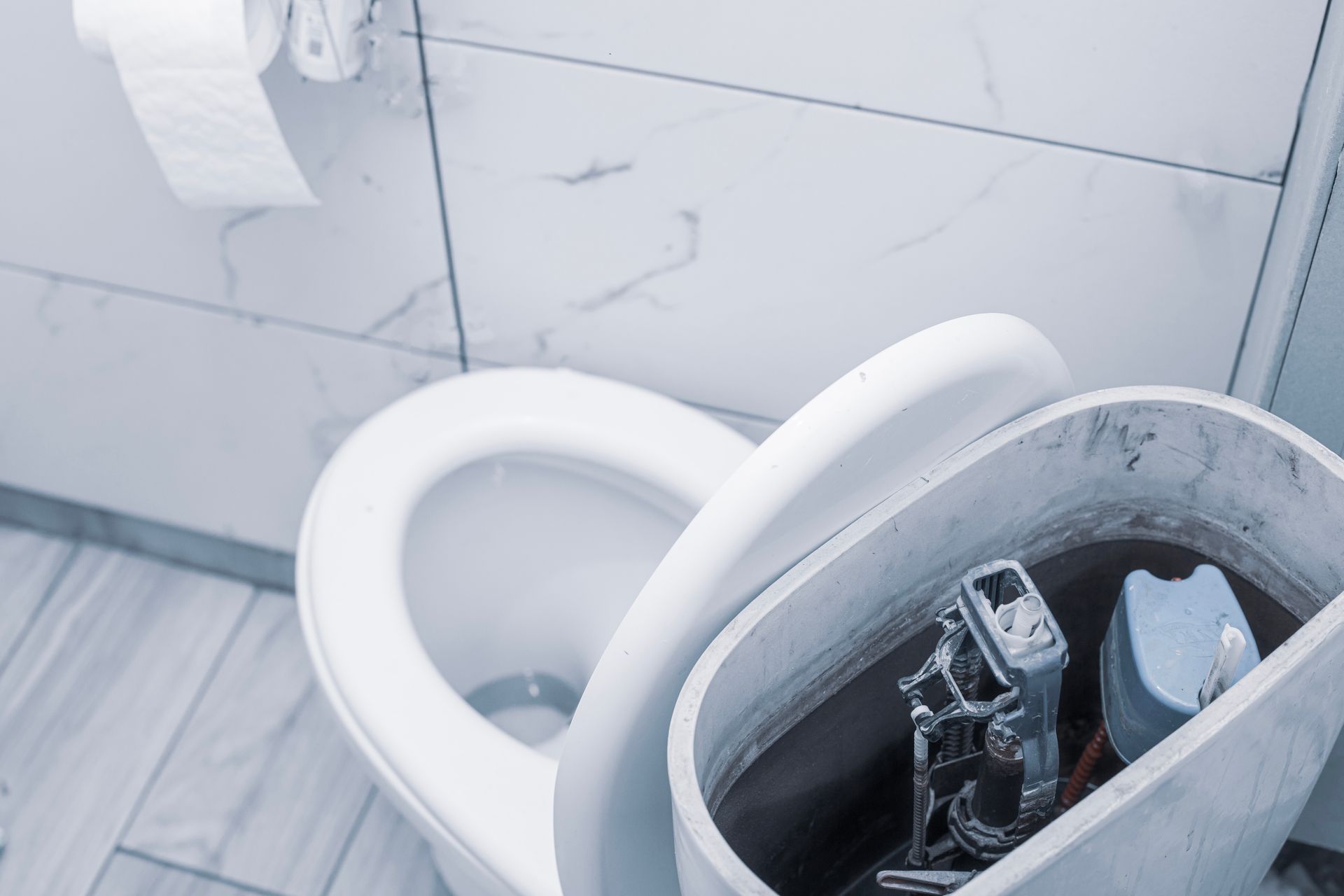 Toilet With the Tank Lid Removed, Showing Internal Components — Full On Plumbing & Gas in Winnellie, NT