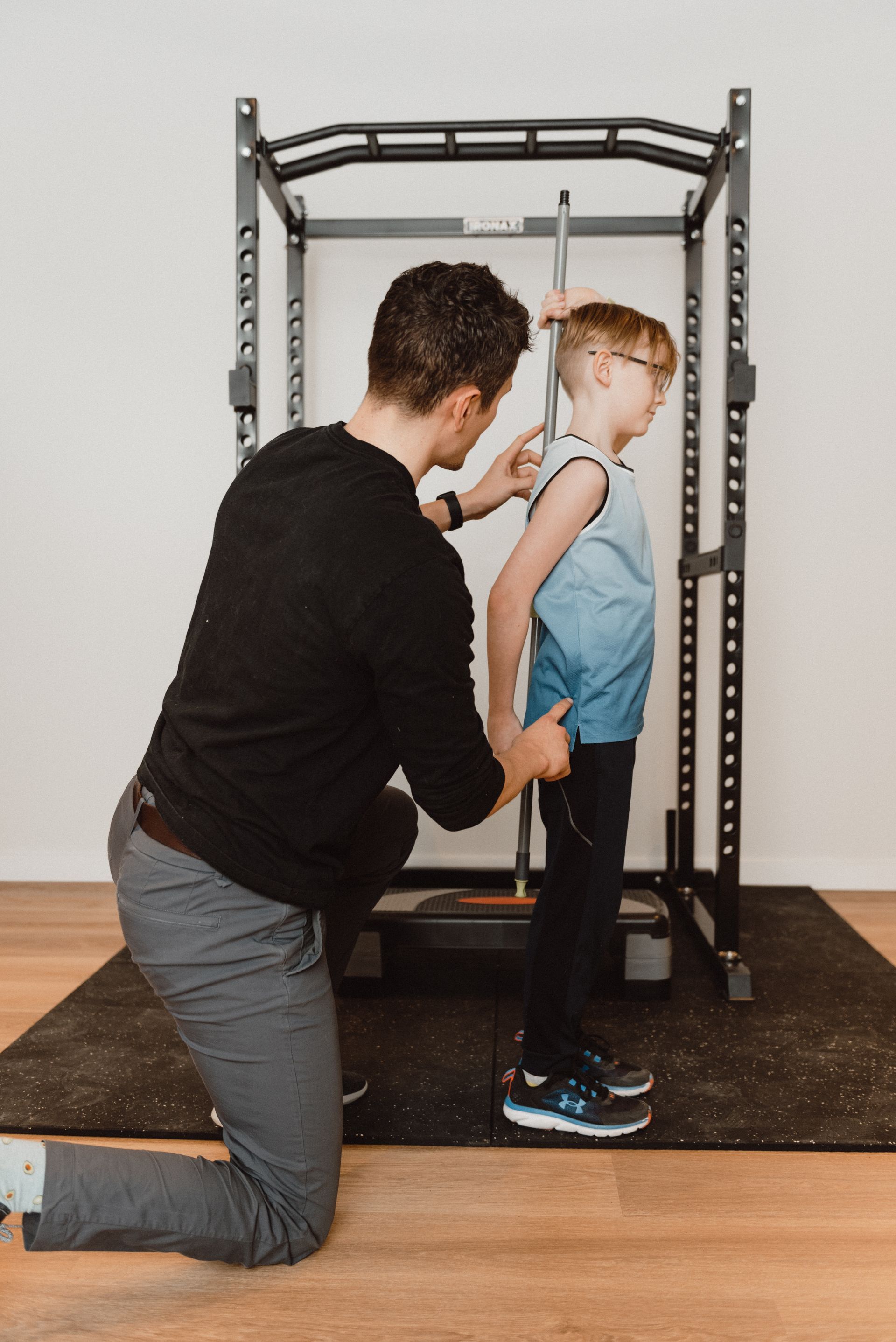 physiotherapist helping patient
