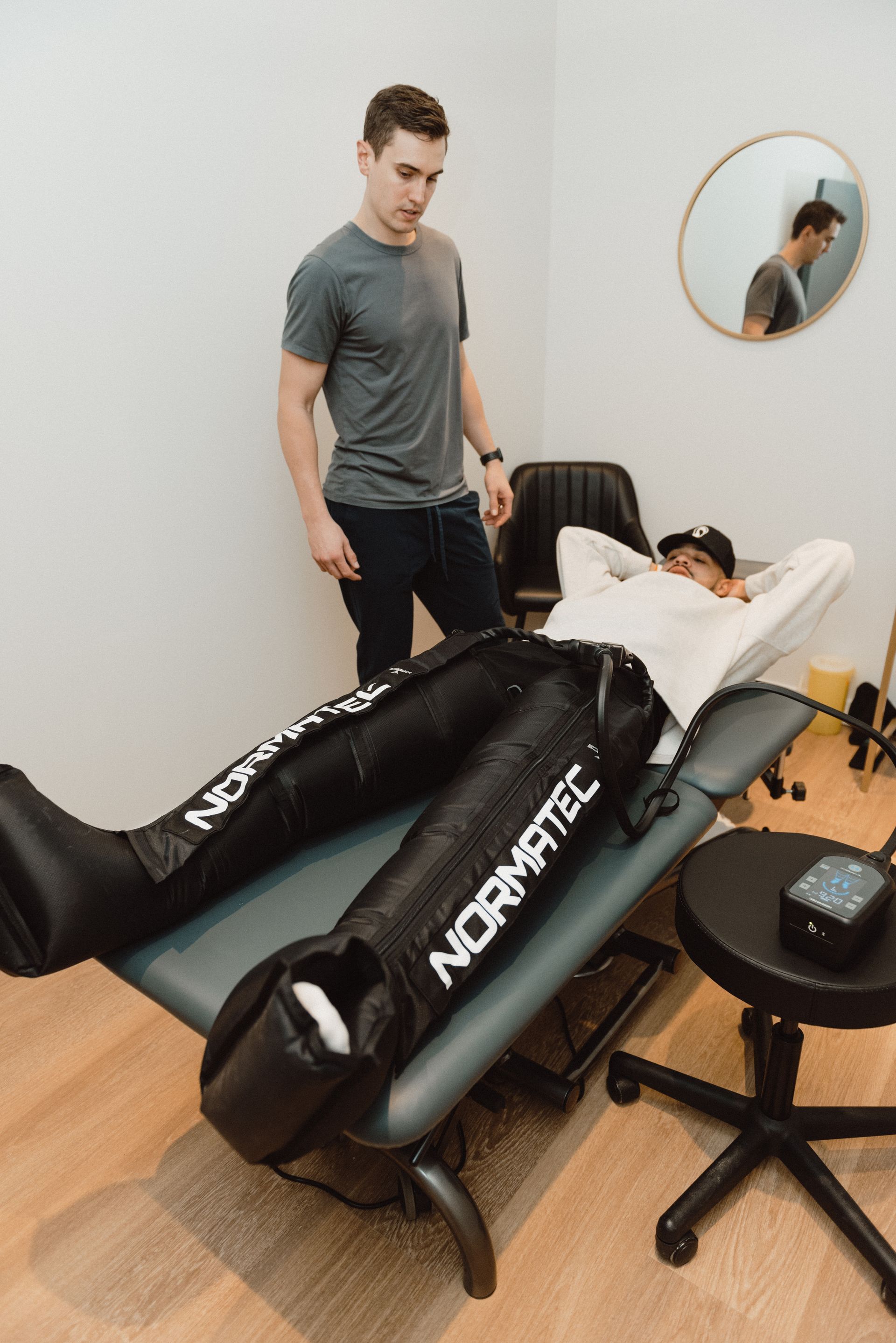 man getting hot stone therapy