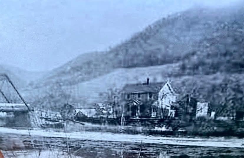 Early 1900s photo of the river, the iron bridge and the farmed hillside below where Resting Eagle sits today
