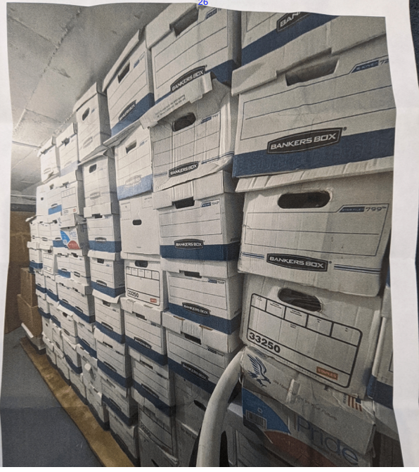 A bunch of boxes are stacked on top of each other
