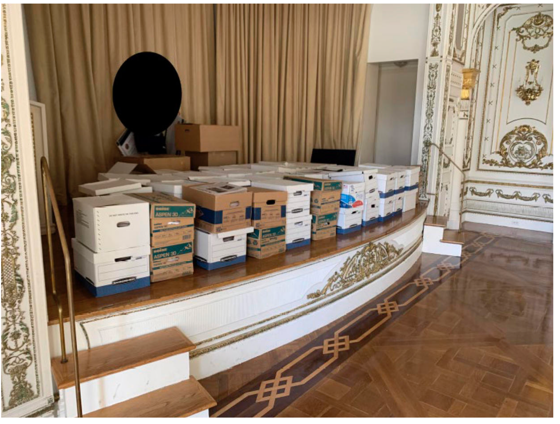 Boxes are stacked on top of each other on a stage