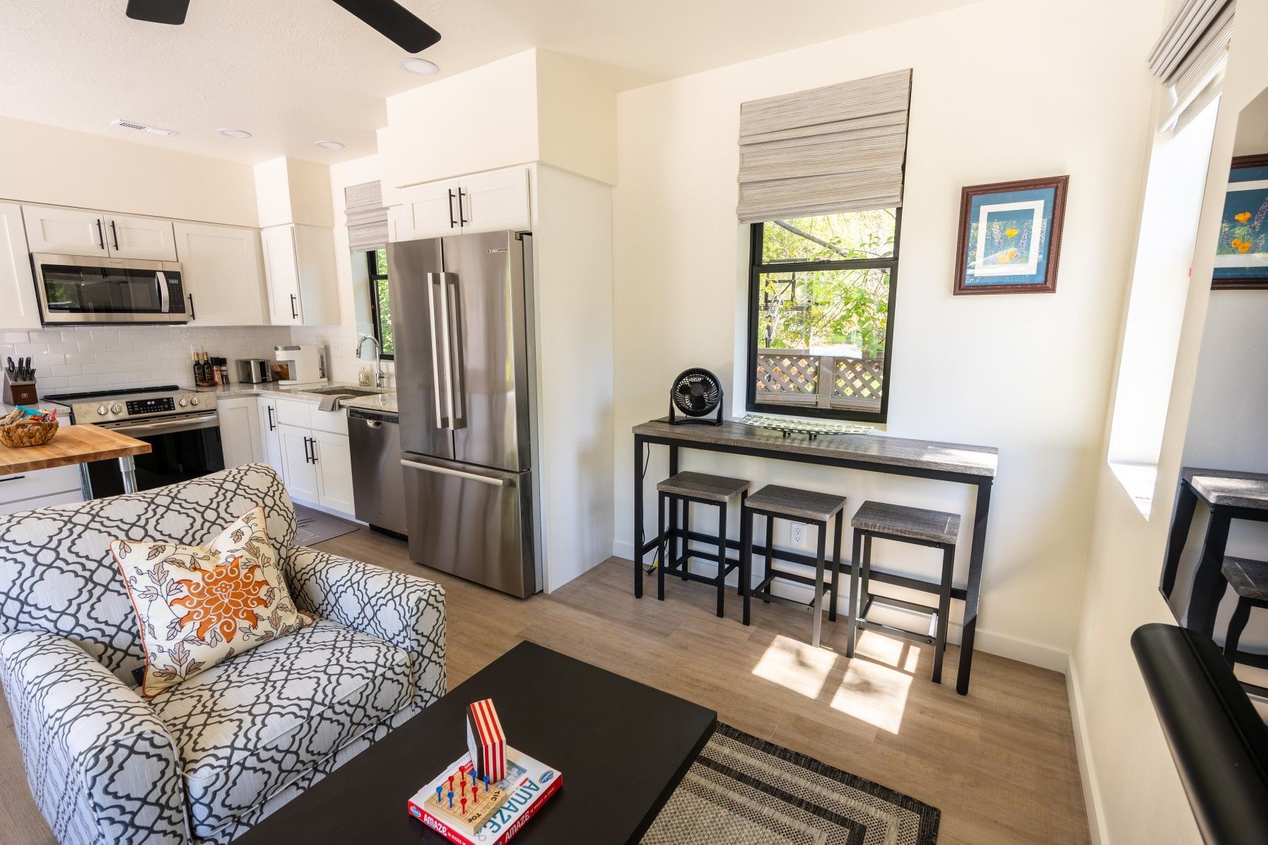 Perpetual Homes ADU:  Small, open-concept living space with kitchen and dining area. 